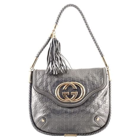 gucci britta bag|GUCCI Guccissima Medium Britt Tassel Shoulder Bag.